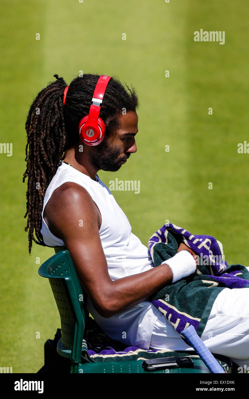 Wimbledon, UK. 04th July, 2015. The Wimbledon Tennis Championships. Gentlemens Singles third round match between twenty second seed Viktor Troicki (SRB) and Dustin Brown (GER). A relaxed looking Dustin Brown listens to his music ahead of the match Credit:  Action Plus Sports/Alamy Live News Stock Photo