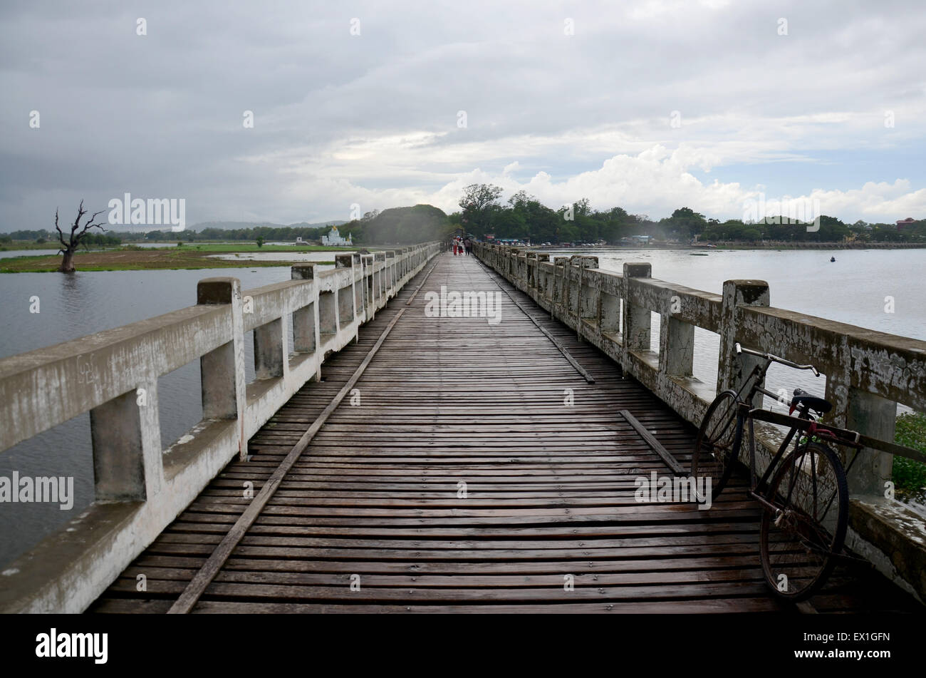 U Bein Bridge is a crossing that spans the Taungthaman Lake near ...