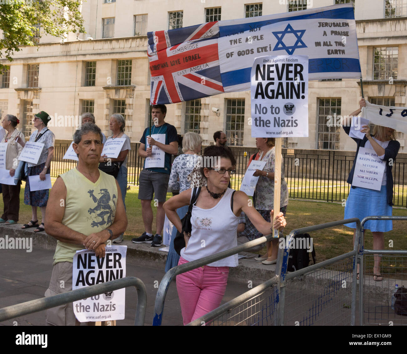 London, 04th July 2015. Anti-fascist protesters gather in Whitehall opposite Downing Street to oppose a Neo-Nazi protest dubbed 'Campaign 4 Truth'. The fascists original plan was to protest in the Jewish neighbourhood of Golders Green but the event was banned and moved to Whitehall outside Downing Street by the Metropolitan Police.  Credit:  Patricia Phillips/Alamy Live News Stock Photo