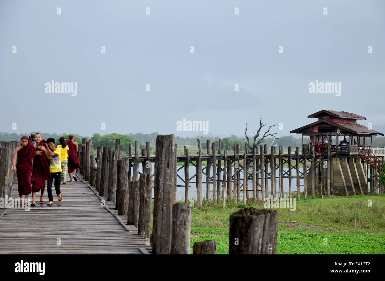U Bein Bridge is a crossing that spans the Taungthaman Lake near ...