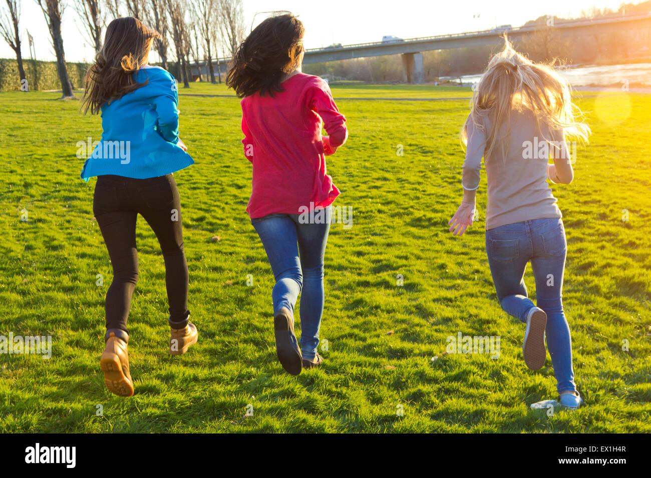 Three young pretty girls jogging hi res stock photography and