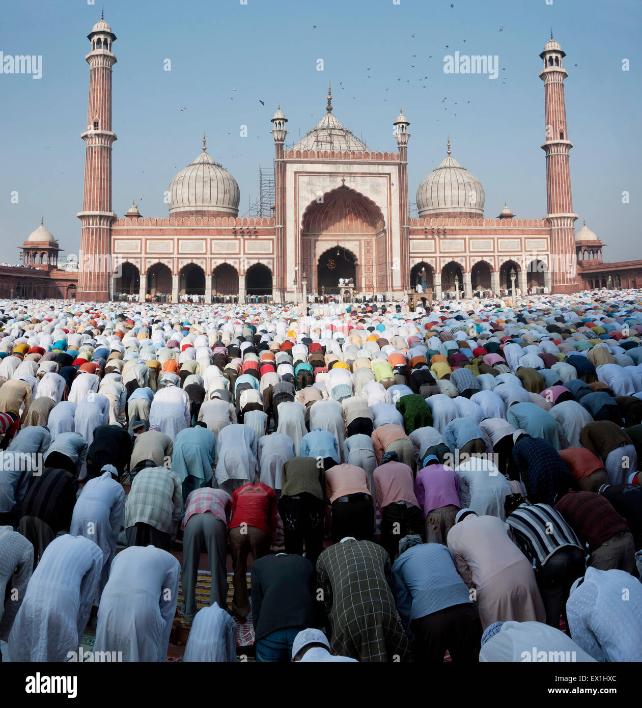 People offering prayers during the festival of Eid-ul-fitr at the Jama Masjid mosque in old Delhi, India. Stock Photo