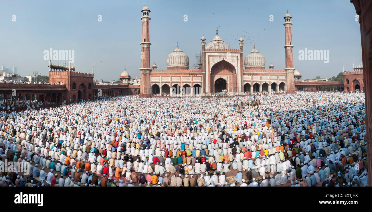 Panoramic shot of the festival of Eid-ul-fitr being celebrated at the Jama Masjid mosque in old Delhi, India. Stock Photo