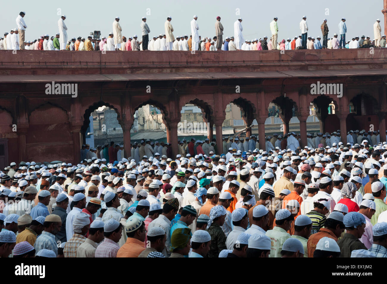 People offering prayers during the festival of Eid-ul-fitr at the Jama Masjid mosque in old Delhi, India. Stock Photo
