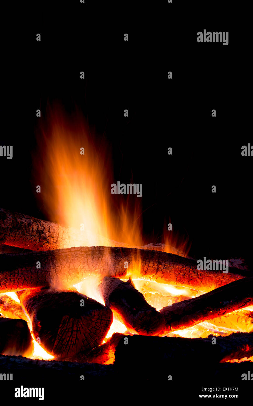 Bonfire in the forest during night at the summertime Stock Photo - Alamy