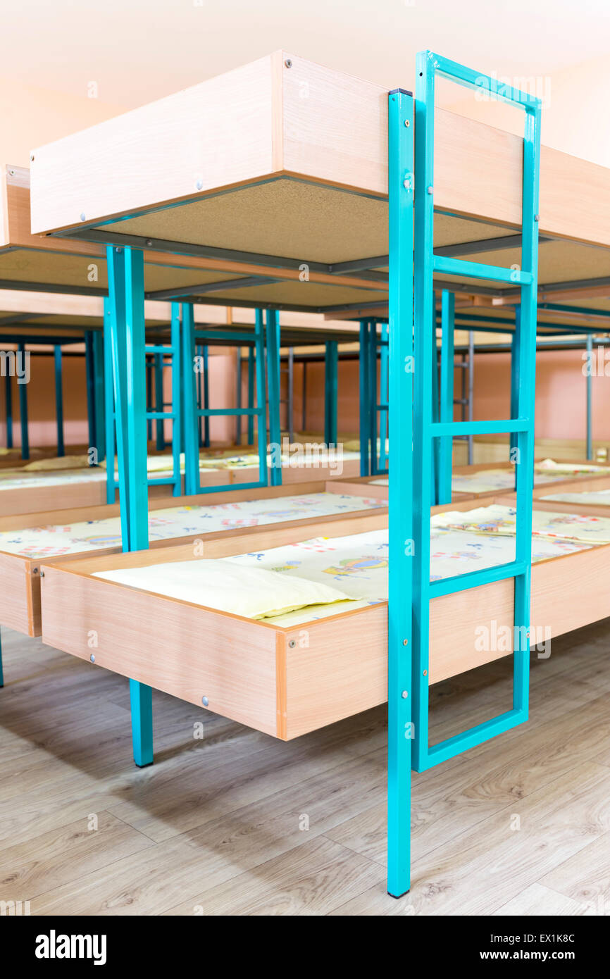 Kindergarten bedroom with small bunk beds with stairs for the kids