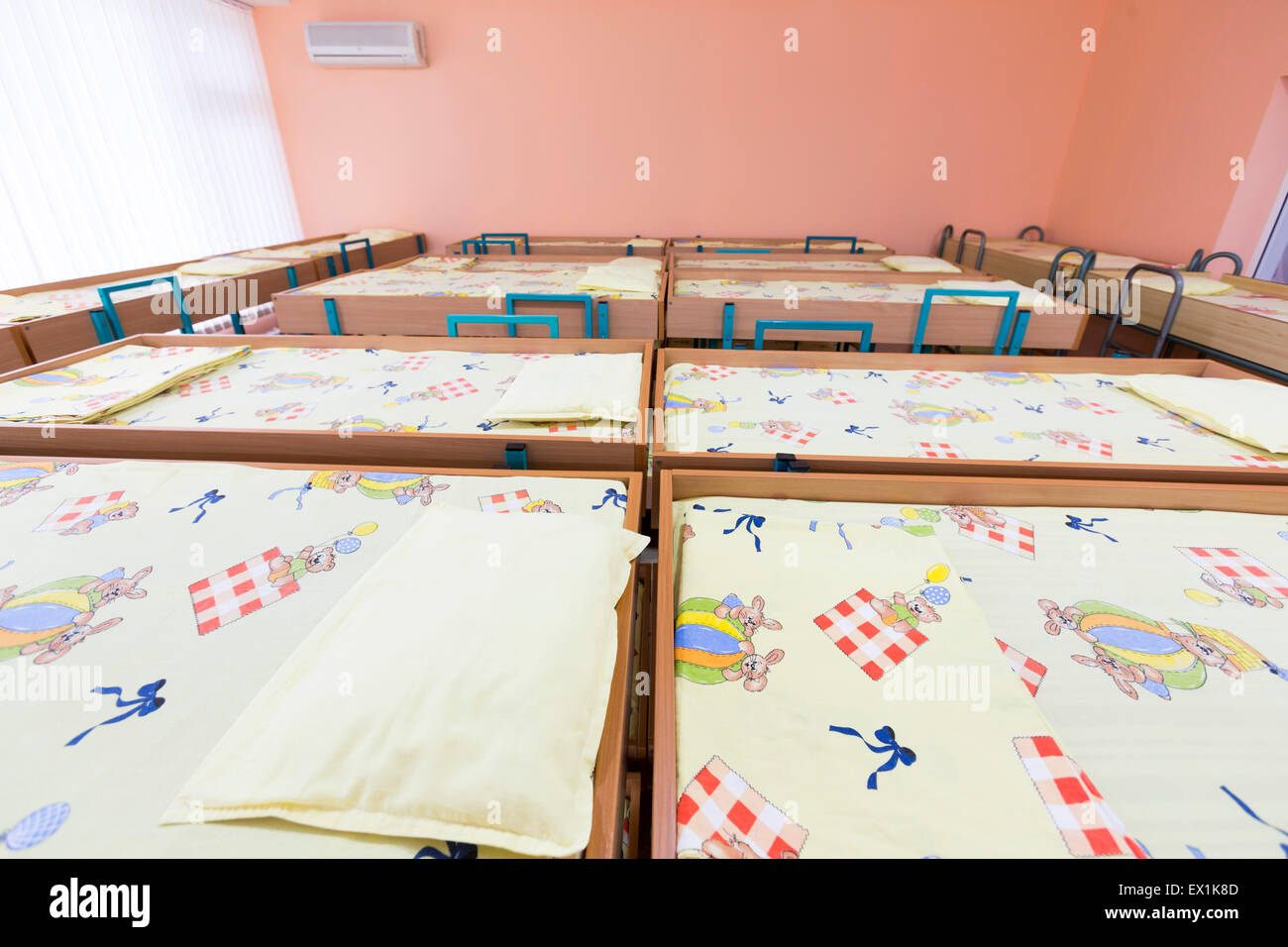 Kindergarten bedroom with small bunk beds with stairs for the kids