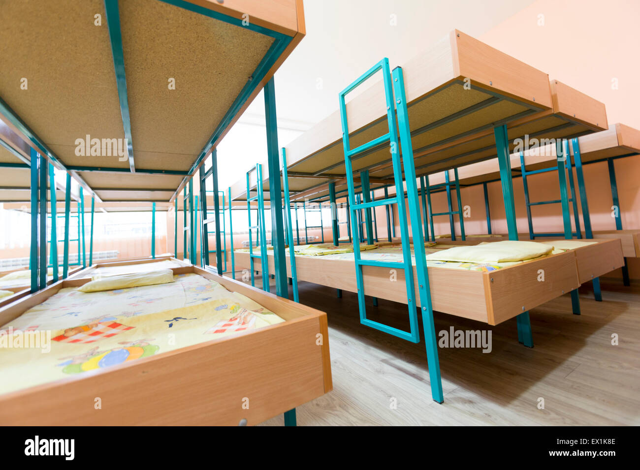 Kindergarten bedroom with small bunk beds with stairs for the kids