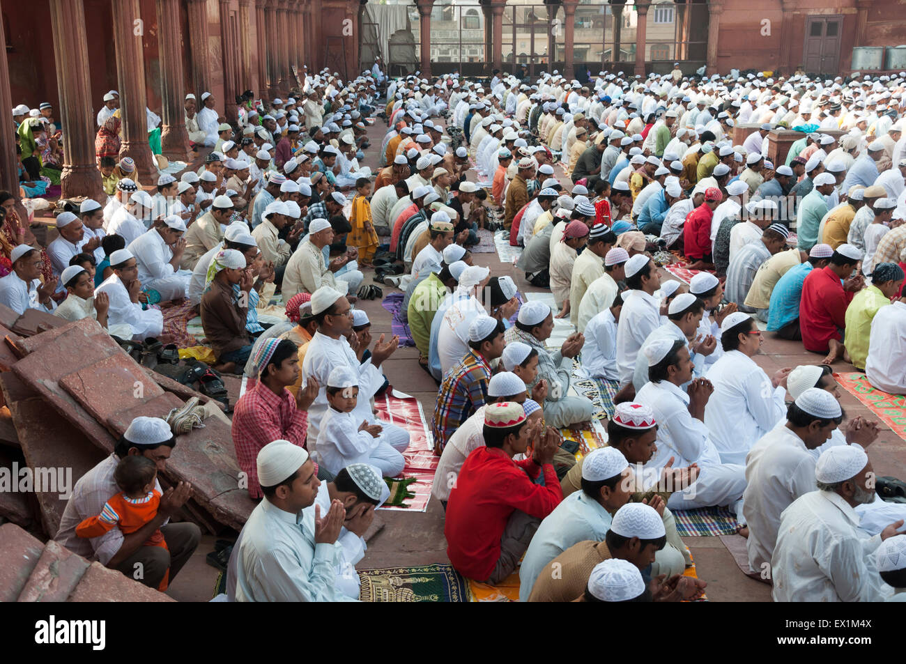Men praying during the festival of Eid-ul-fitr at the Jama Masjid mosque in old Delhi, India. Stock Photo