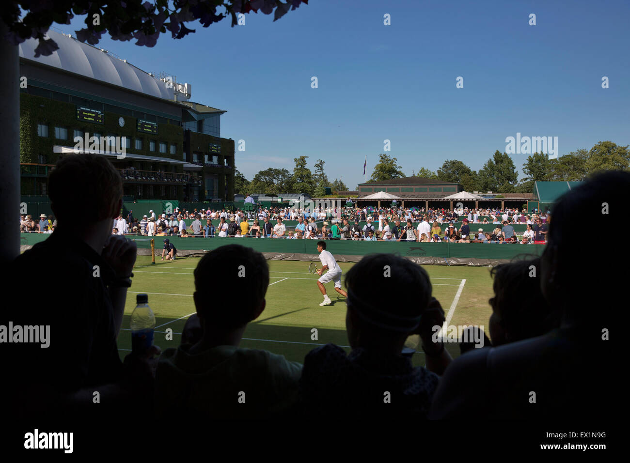 Wimbledon, London, UK. 04th July, 2015. Tennis, Wimbledon, Outside courts 4 and 5 with on the left centrecourt Credit:  Henk Koster/Alamy Live News Stock Photo
