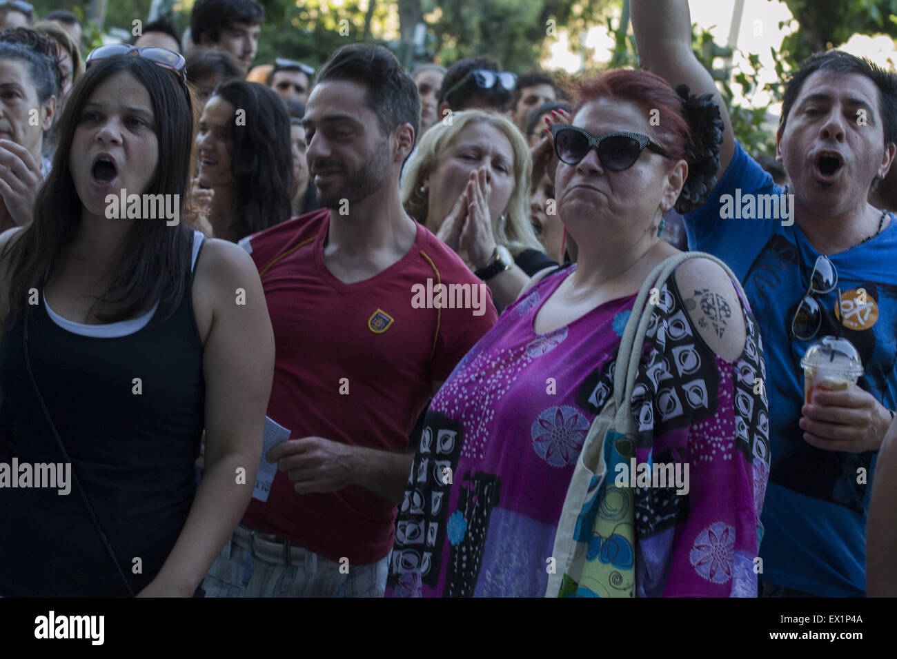 Athens, Greece. 4th July, 2015. Protesters shout slogans against Greek media accusing them of propaganda in favor of the Yes vote on the upcoming referendum. Greece is ranked No 91 out of 180 countries in the World Press Freedom Index, while all mainstream TV channels are owned by Greek tycoons. Credit:  Nikolas Georgiou/ZUMA Wire/ZUMAPRESS.com/Alamy Live News Stock Photo