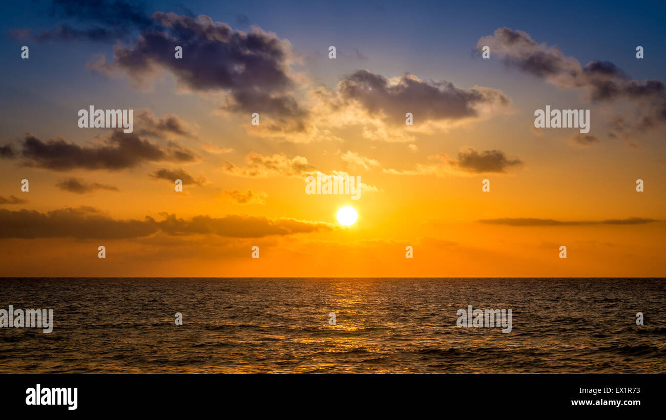 Sunrise over caribbean sea somewhere in Mexico Stock Photo