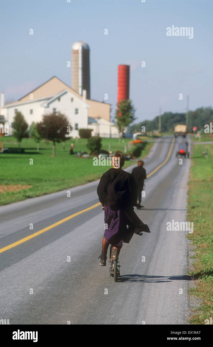 Amish Children riding Scooters Lancaster County, Pennsylvania, U.S.A