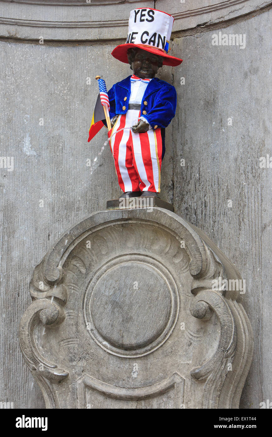 Manneken Pis dressed in a traditional costume of the USA in Brussels,  Belgium for the 4th of July Stock Photo - Alamy