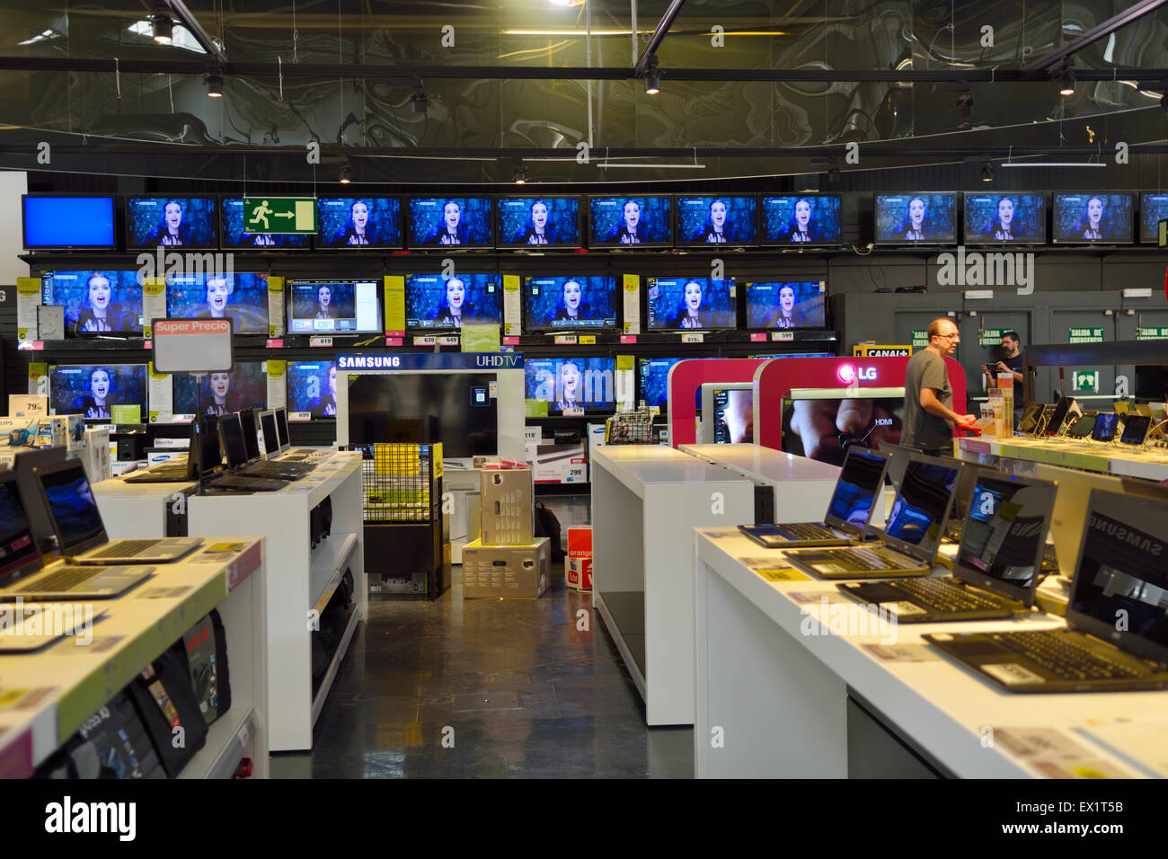 Display of televisions and laptop computers in Carrefour hypermarket. Madrid, Plaza Norte 2 shopping centre, Spain Stock Photo