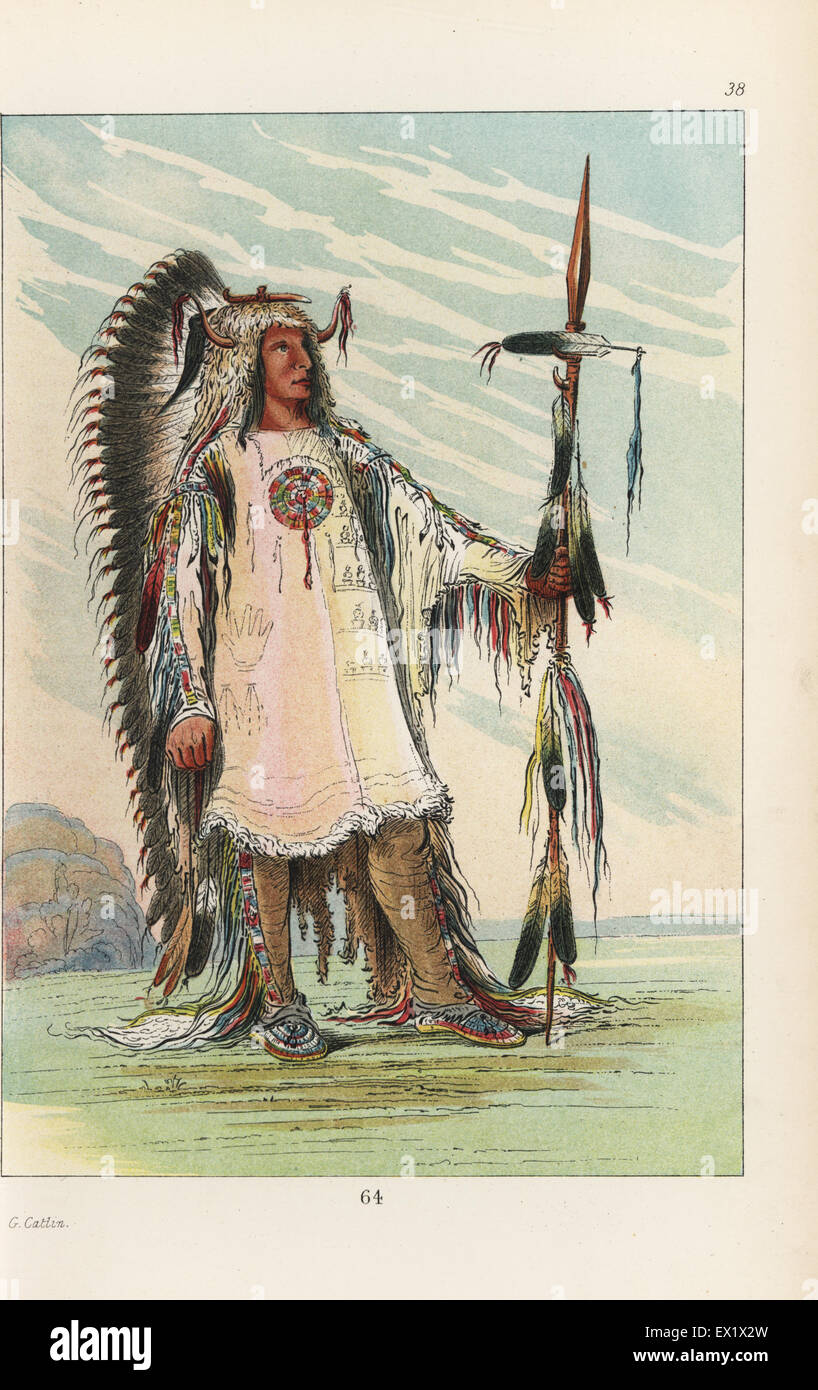 Mandan second chief Mah-to-toh-pa, Four Bears, in sheepskin shirt edged  with scalps and porcupine quills, deerskin leggings, buckskin mocassins, war-eagle  feather headdress and bear-claw necklace. Handcoloured lithograph from  George Catlin's Manners ...
