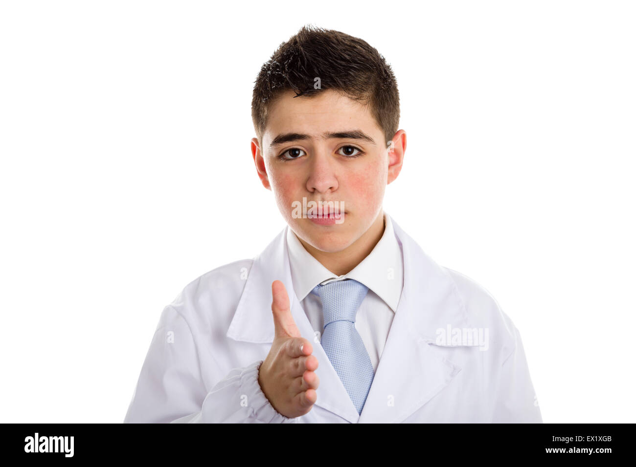 A boy doctor in blue tie and white coat making karate chop motion: this means a definitive point, one that is not in doubt or up for discussion. His acne skin has not ben retouched Stock Photo