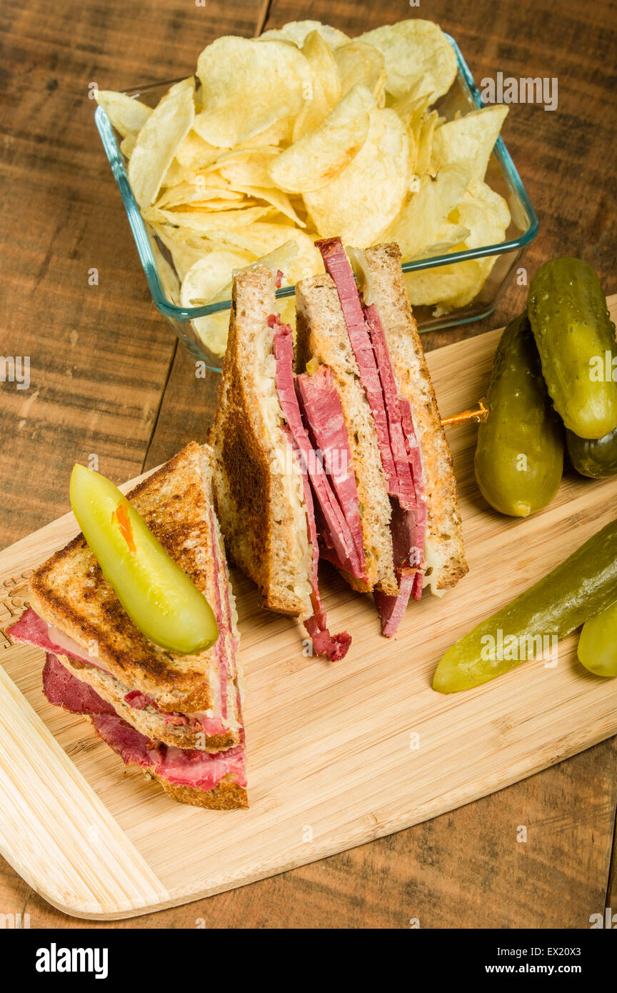 Grilled reuben sandwich with dill pickle spears Stock Photo Alamy