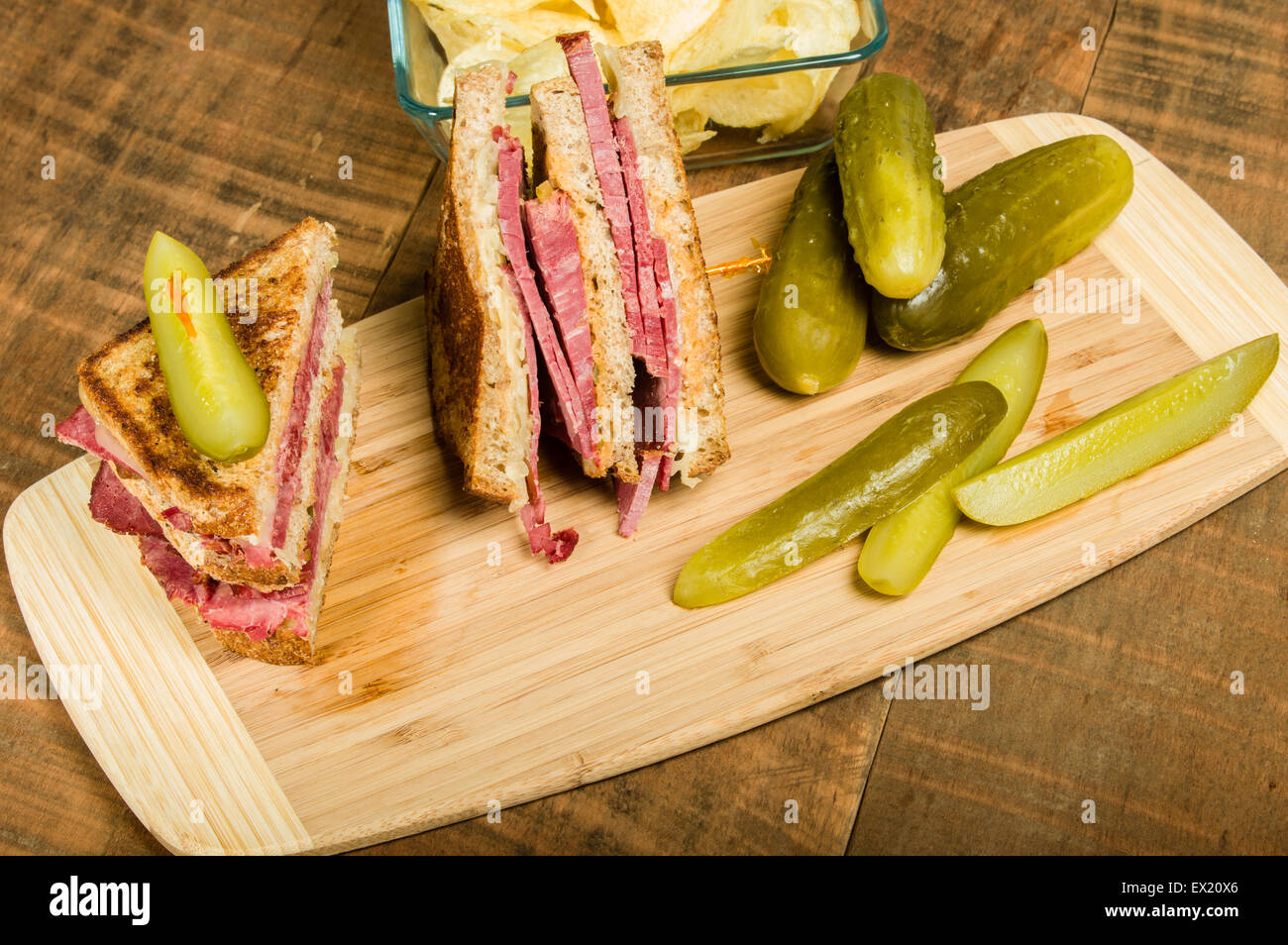 Grilled reuben sandwich with dill pickle spears Stock Photo Alamy