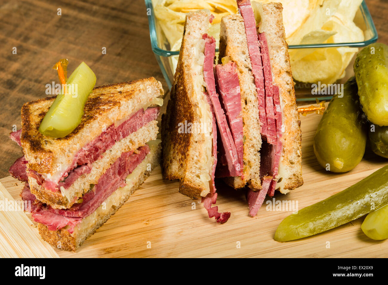 Grilled reuben sandwich with dill pickle spears Stock Photo Alamy