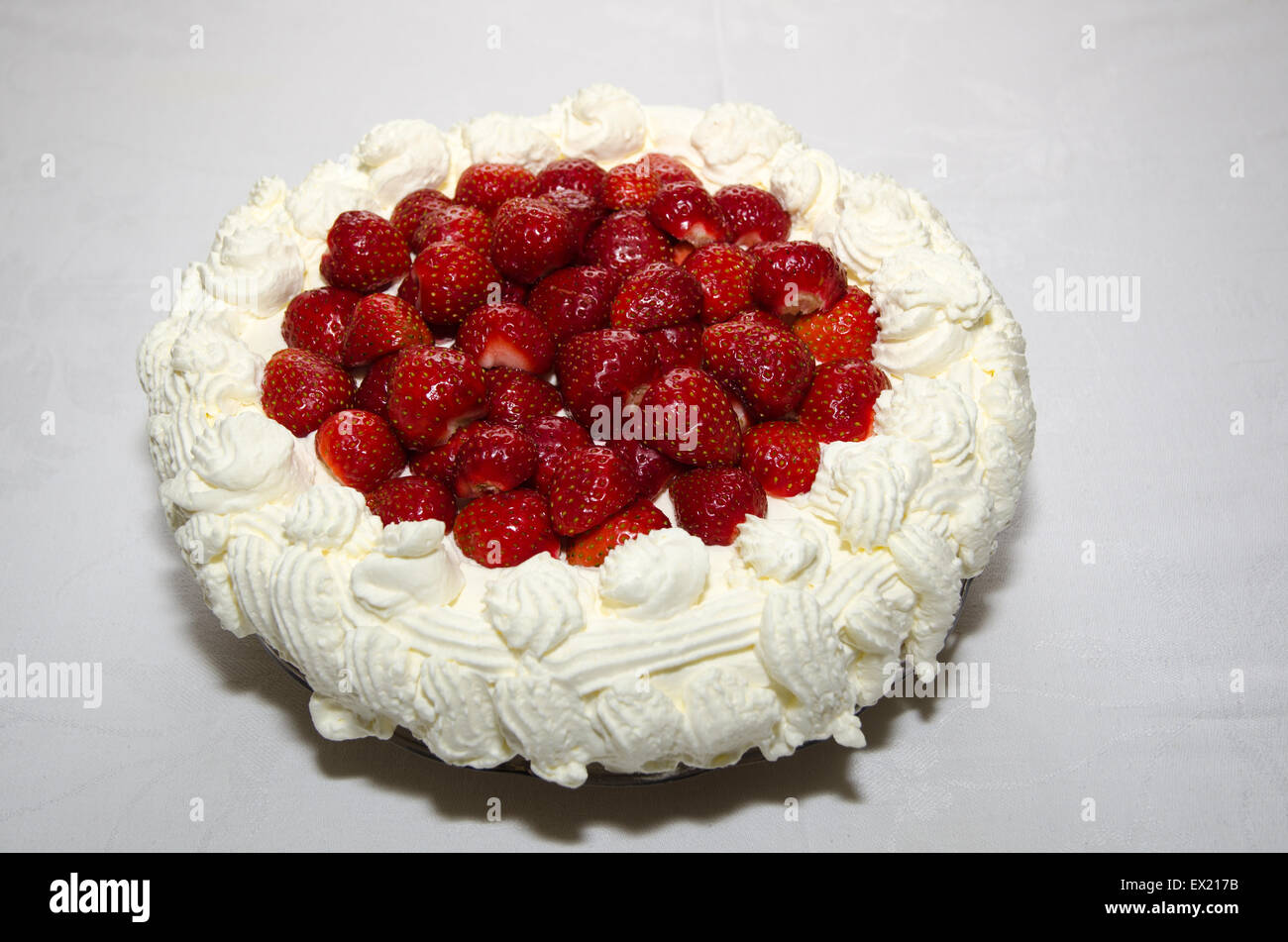 Creamy delicious strawberry cake at white background Stock Photo - Alamy