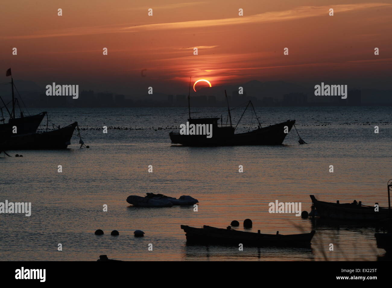 An annular solar eclipse is observed in Yantai, Shandong province January 15, 2010. VCP Stock Photo