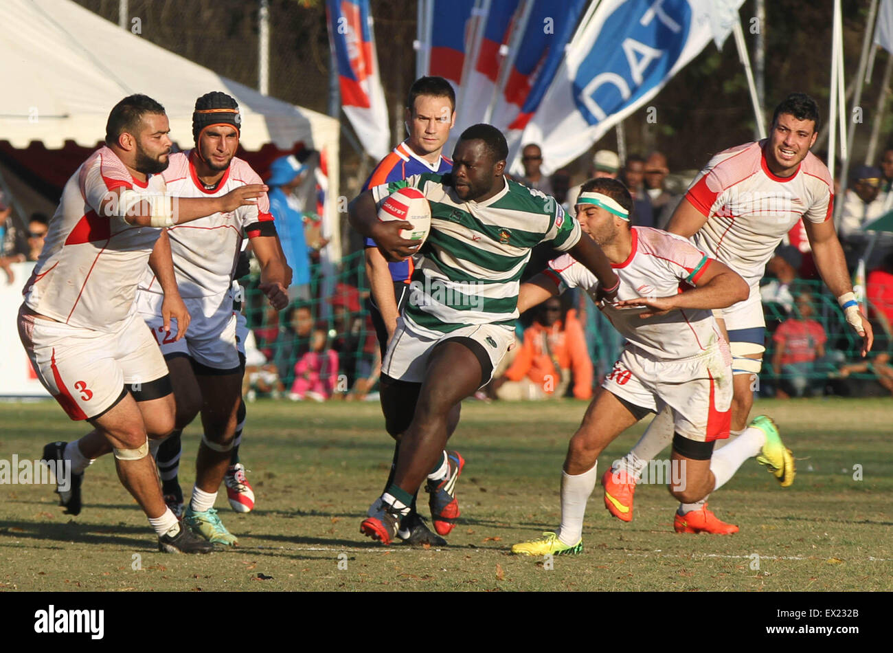 Harare, Zimbabwe. 4th July, 2015. Zimbabwean lock player Njabulo Ndlovu (C) competes during an Africa Rugby Cup Group 1A match against Tunisia at the Prince Edward School ground in Harare, Zimbabwe, July 4, 2015. Zimbabwe won 19-8. © Stringer/Xinhua/Alamy Live News Stock Photo