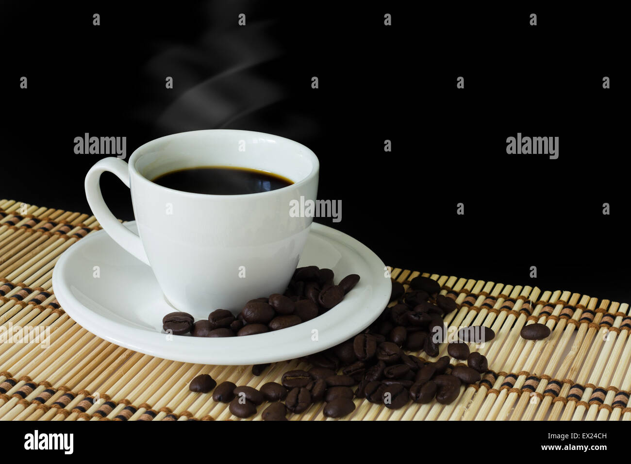 white cup of coffee on black background Stock Photo Alamy