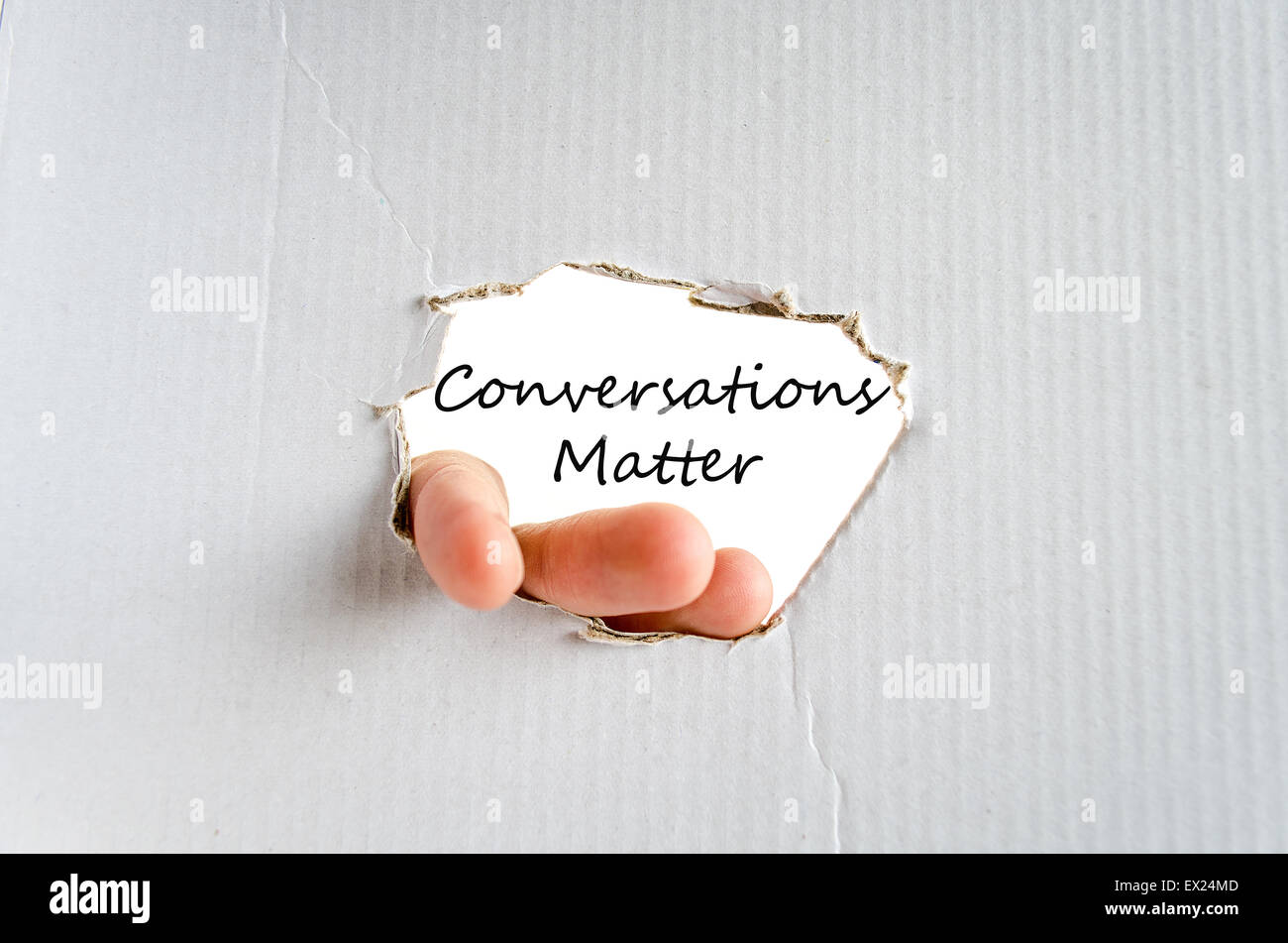 Hand and  text concept on the cardboard background Stock Photo