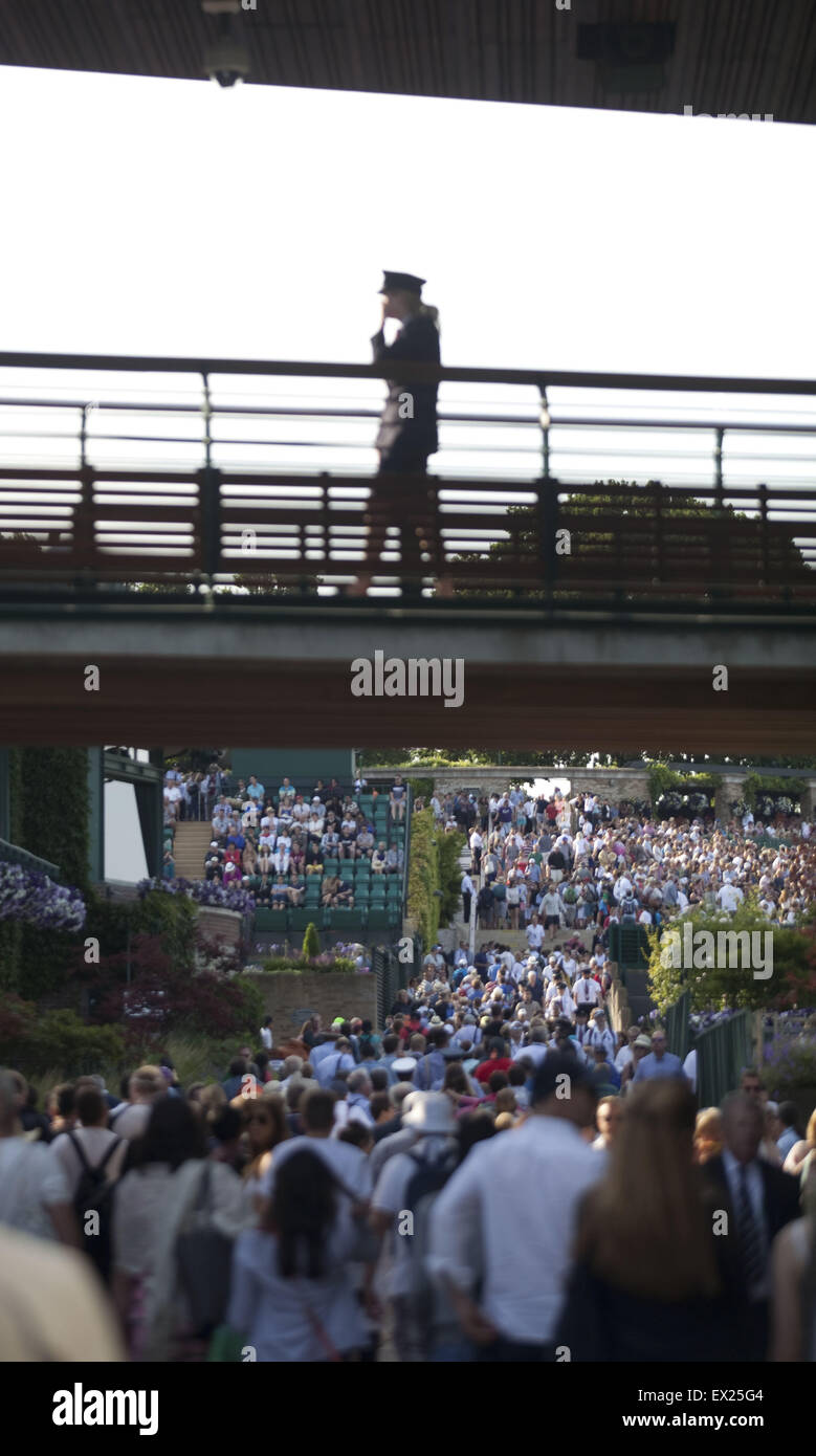 London, UK. 3rd July, 2015. Spectators at Wimbledon.The Championships, Wimbledon or simply Wimbledon, is the oldest tennis tournament in the world, and is widely considered the most prestigious. It has been held at the All England Club in Wimbledon, London since 1877, London, UK. © Veronika Lukasova/ZUMA Wire/Alamy Live News Stock Photo
