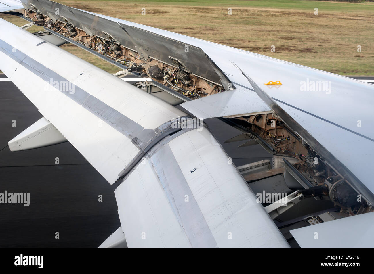 Airbus A319 with flaps in up posistion to slow down after landing Stock Photo