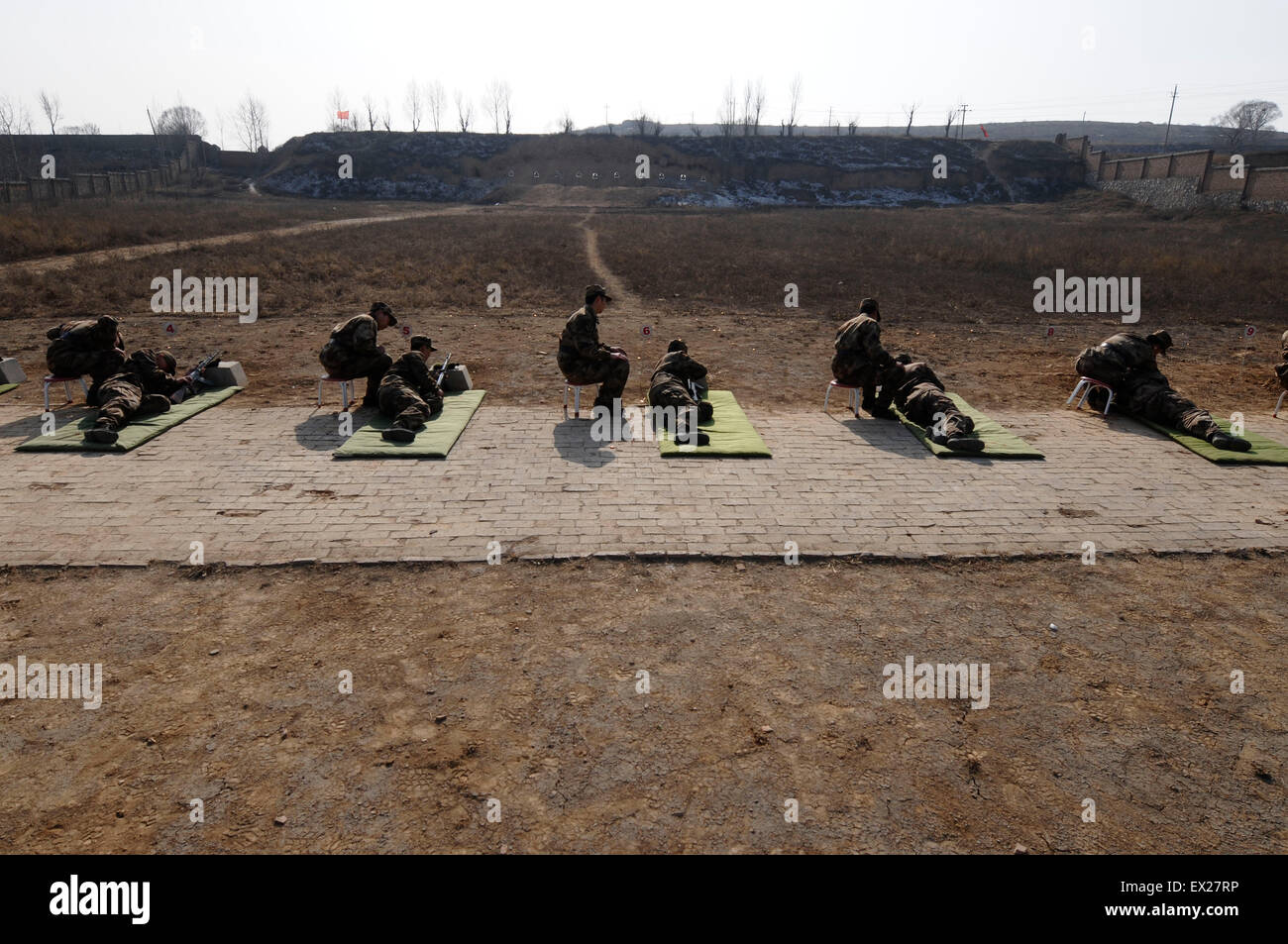 Recruits of China's People's Liberation Army (PLA) attend a training shoot at a military base in Changzhi, Shanxi province, Febr Stock Photo
