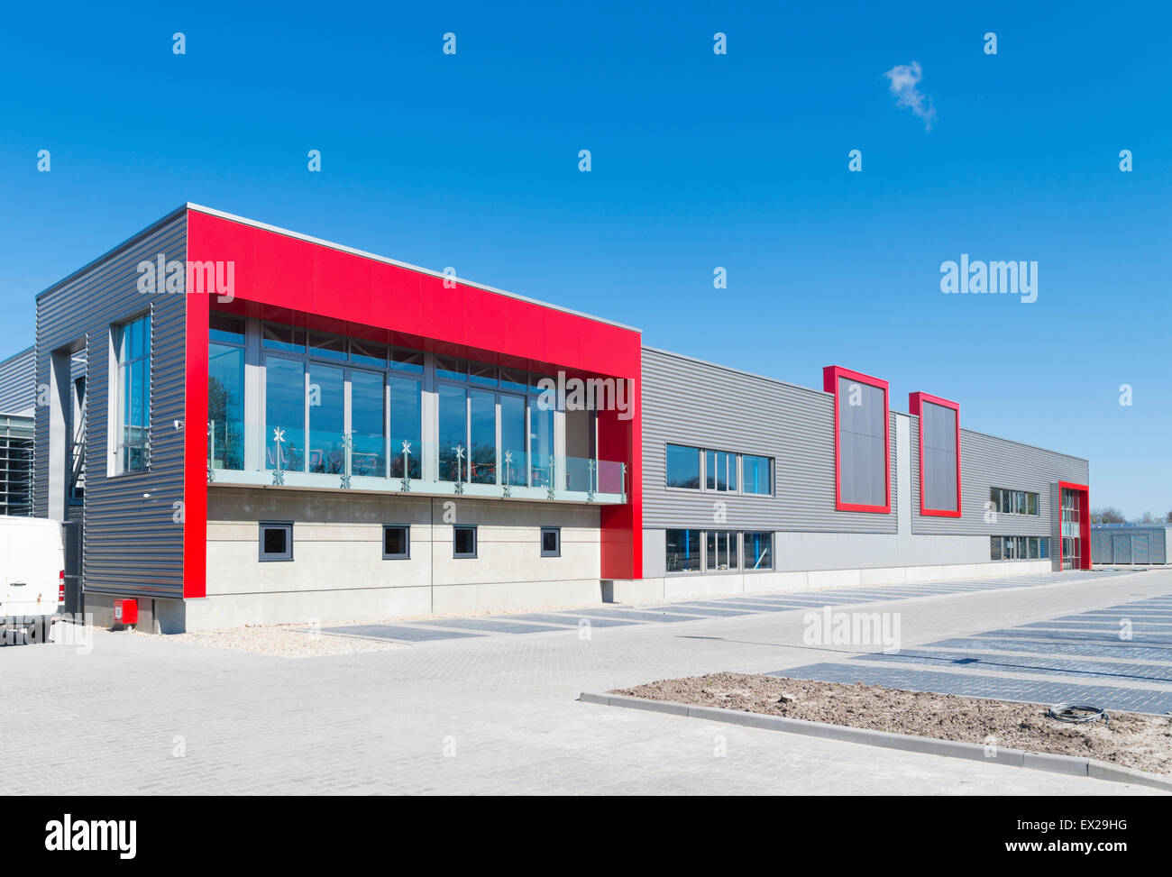 newly build modern red office building with warehouse Stock Photo Alamy