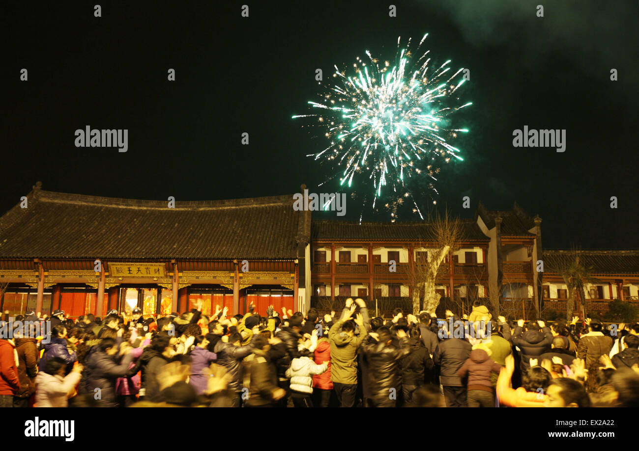 Worshippers burn offerings on the fifth day of the Chinese Lunar New