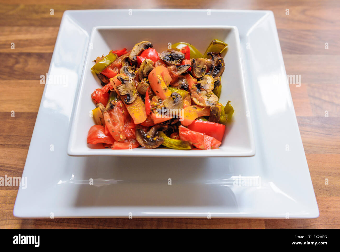 Roasted Peppers, Onions and Mushrooms and tomatoes. Stock Photo