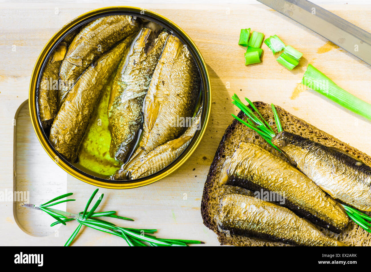 Canned smoked sprats or sardines on the table top view Stock Photo Alamy