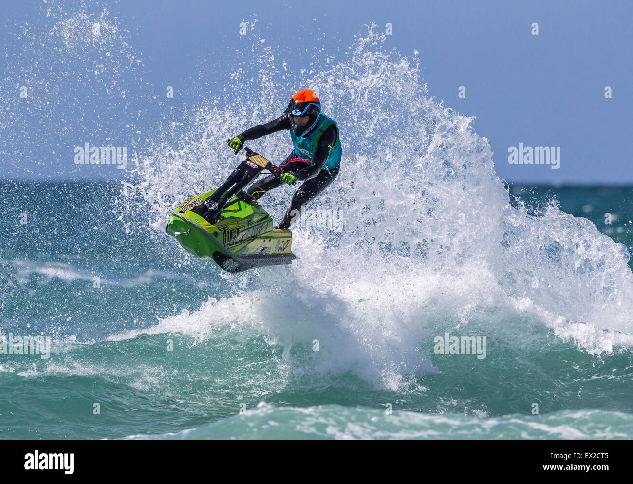 Rider competing at IFWA World Tour Jet Ski Championship 2015, Fistral beach, Cornwall, UK Stock Photo