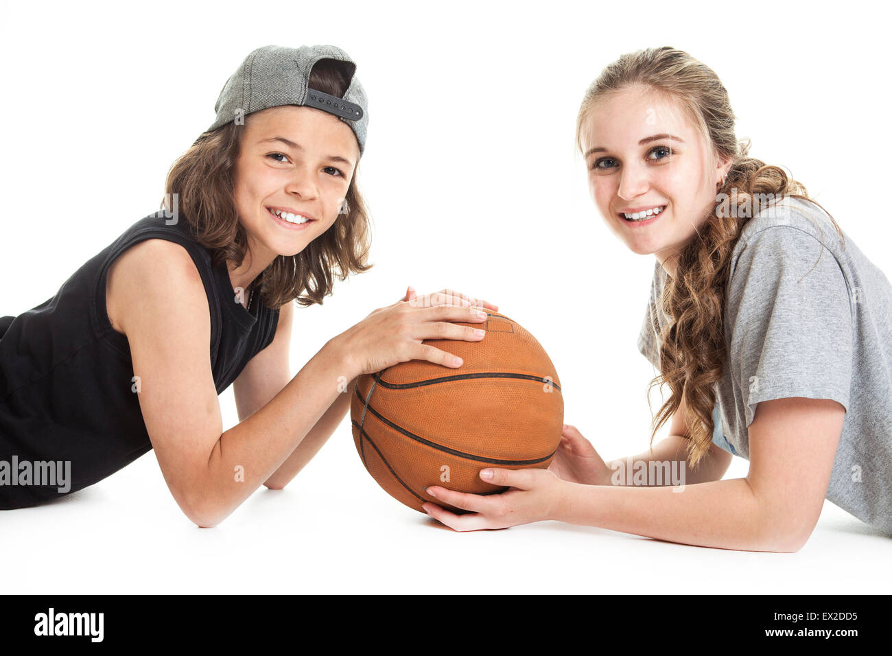 Portrait of brother and sister with a basket ball Stock Photo Alamy