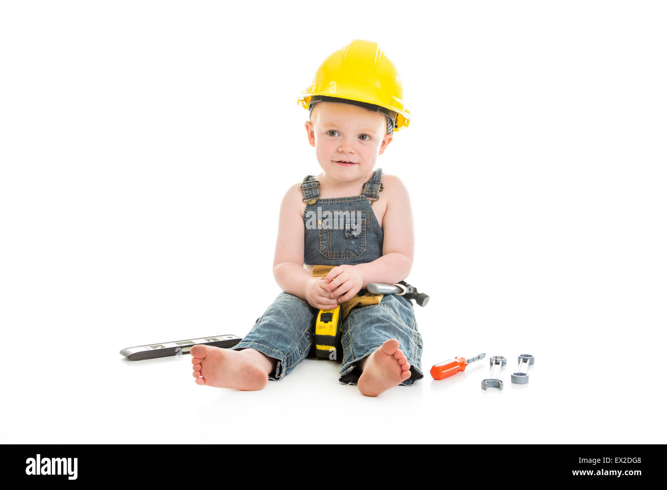 carpenter baby boy portrait over a isolated white background Stock Photo