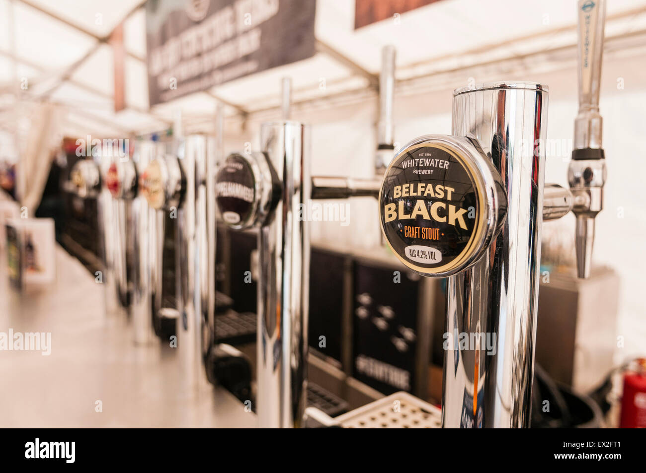 Beer pumps dispensing beers from the Whitewater Brewery in Belfast Stock Photo