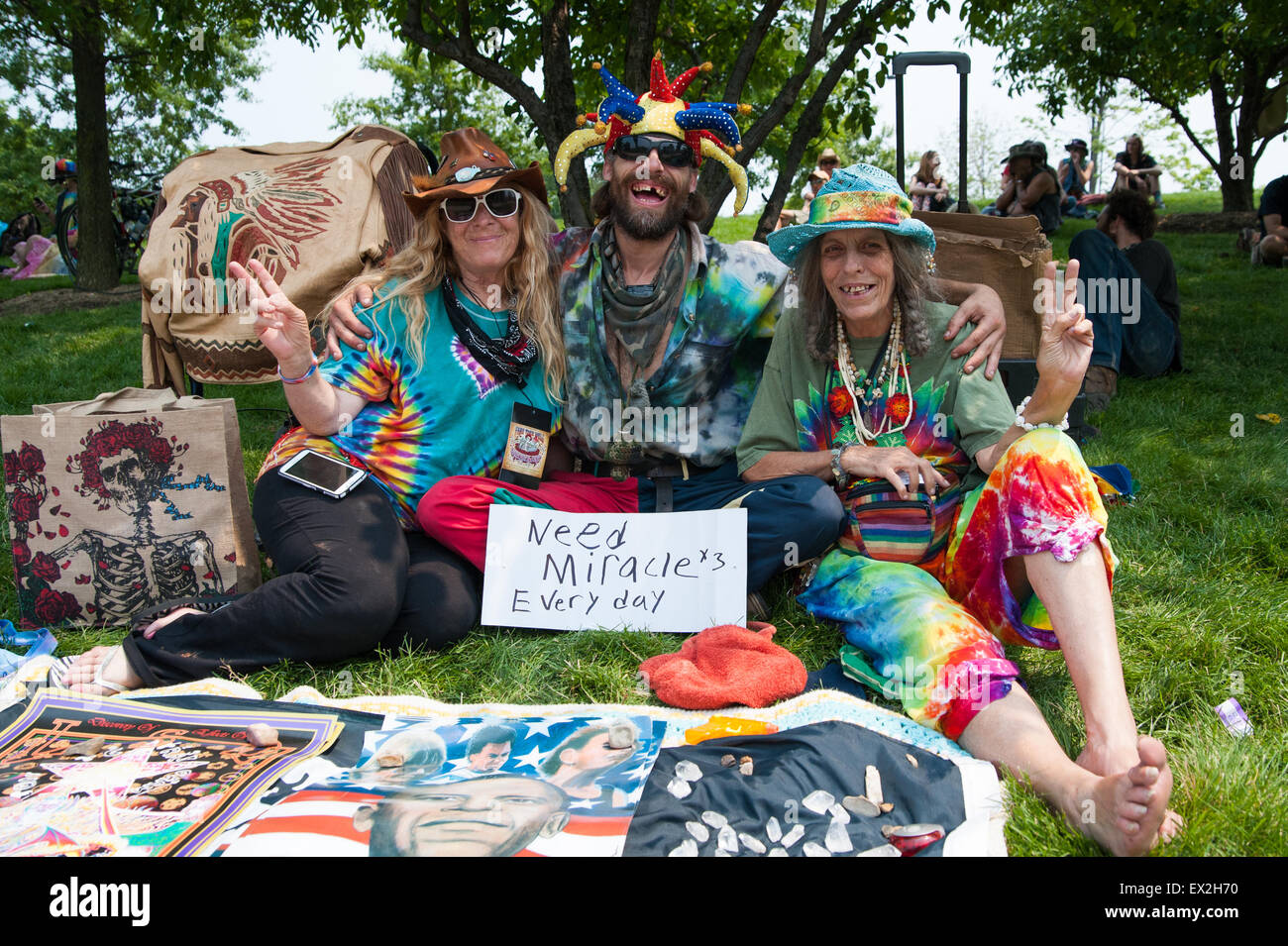 Chicago, Illinois, USA. 4th July, 2015. Rainbow Family members from southern Oregon, sit on the lawn outside of Soldier Field in hopes of acquiring tickets for the Grateful Dead's 4th of July 'Fare Thee Well' show. Credit:  Charles Jines/Alamy Live News Stock Photo
