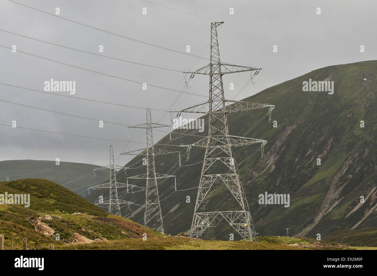 Electric pylons on the A9 in the Scottish Highlands Stock Photo - Alamy
