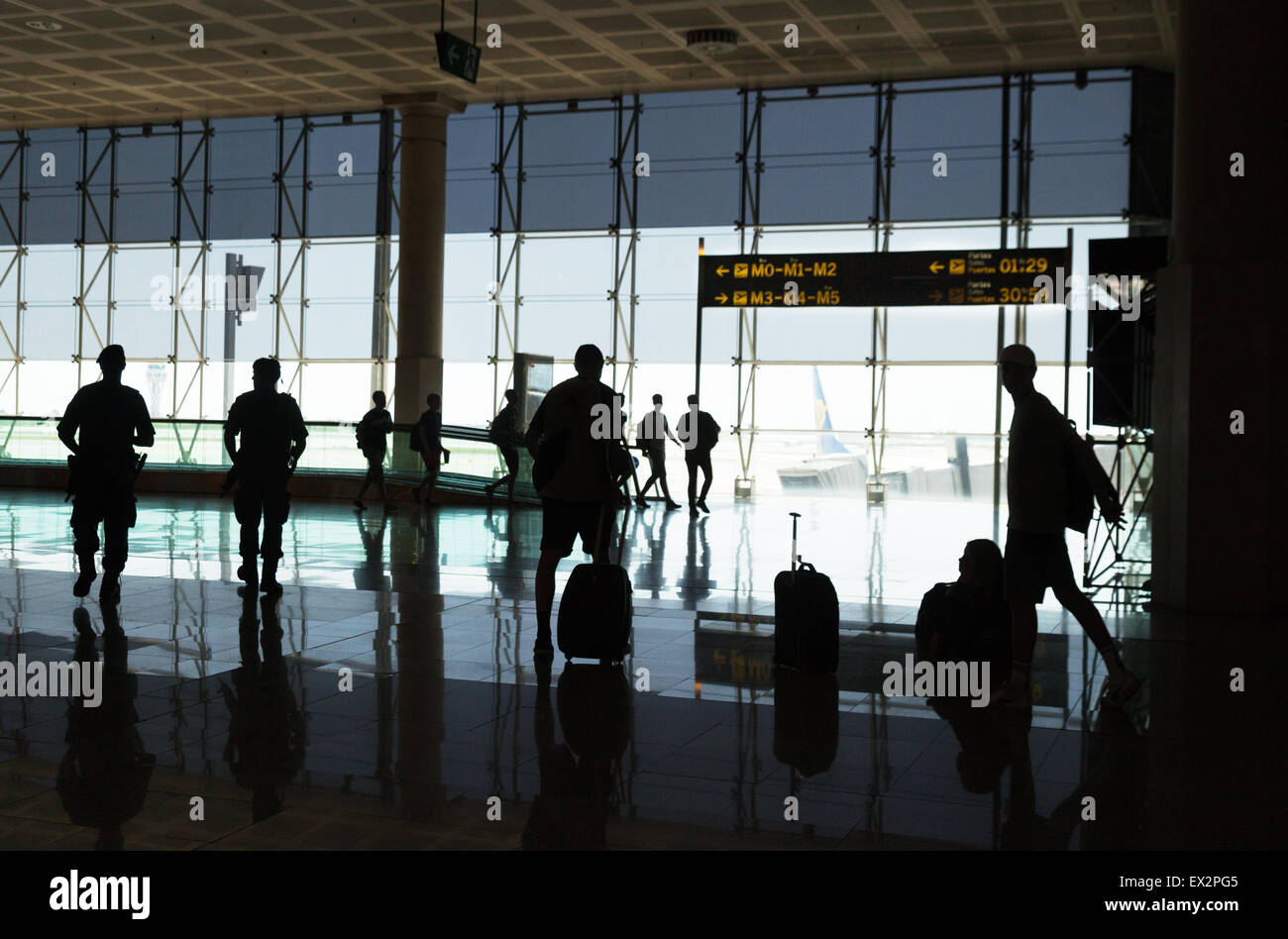 Silhouettes of people in the departure lounge, El Prat airport ( Barcelona airport ), Spain, Europe Stock Photo