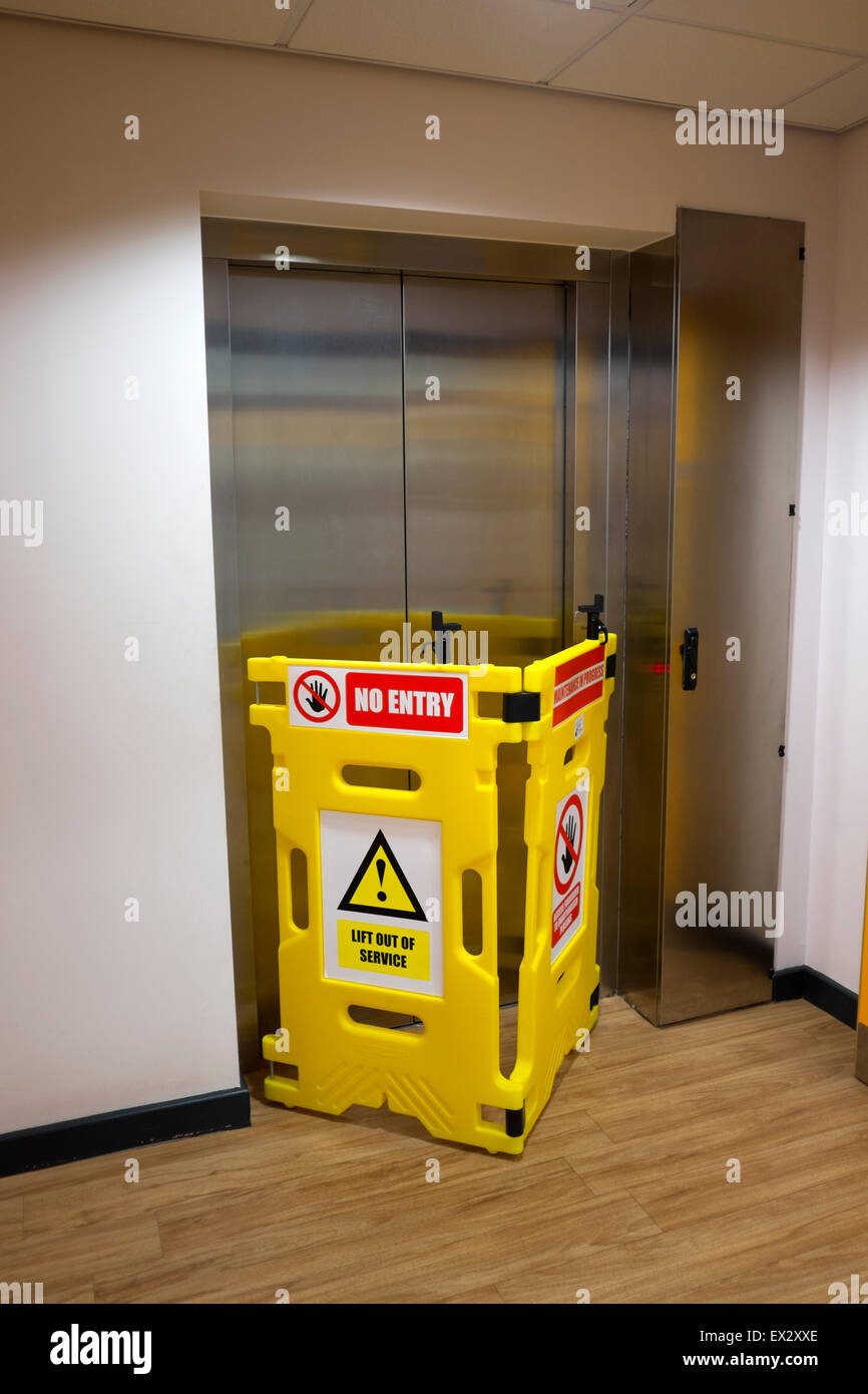 Elevator Lift Out Of Order Broken Guard Health and Safety Stock Photo