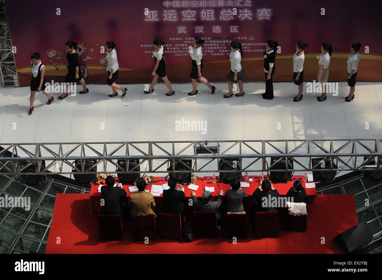 Candidates attend an etiquette test during a job fair recruiting the airline attendants for the 2010 Guangzhou Asian Games in Wu Stock Photo