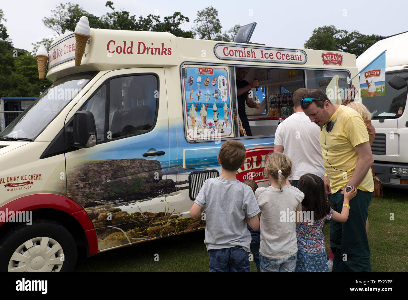 Families Queuing Up for Ice Cream Van Summer Treat Stock Photo