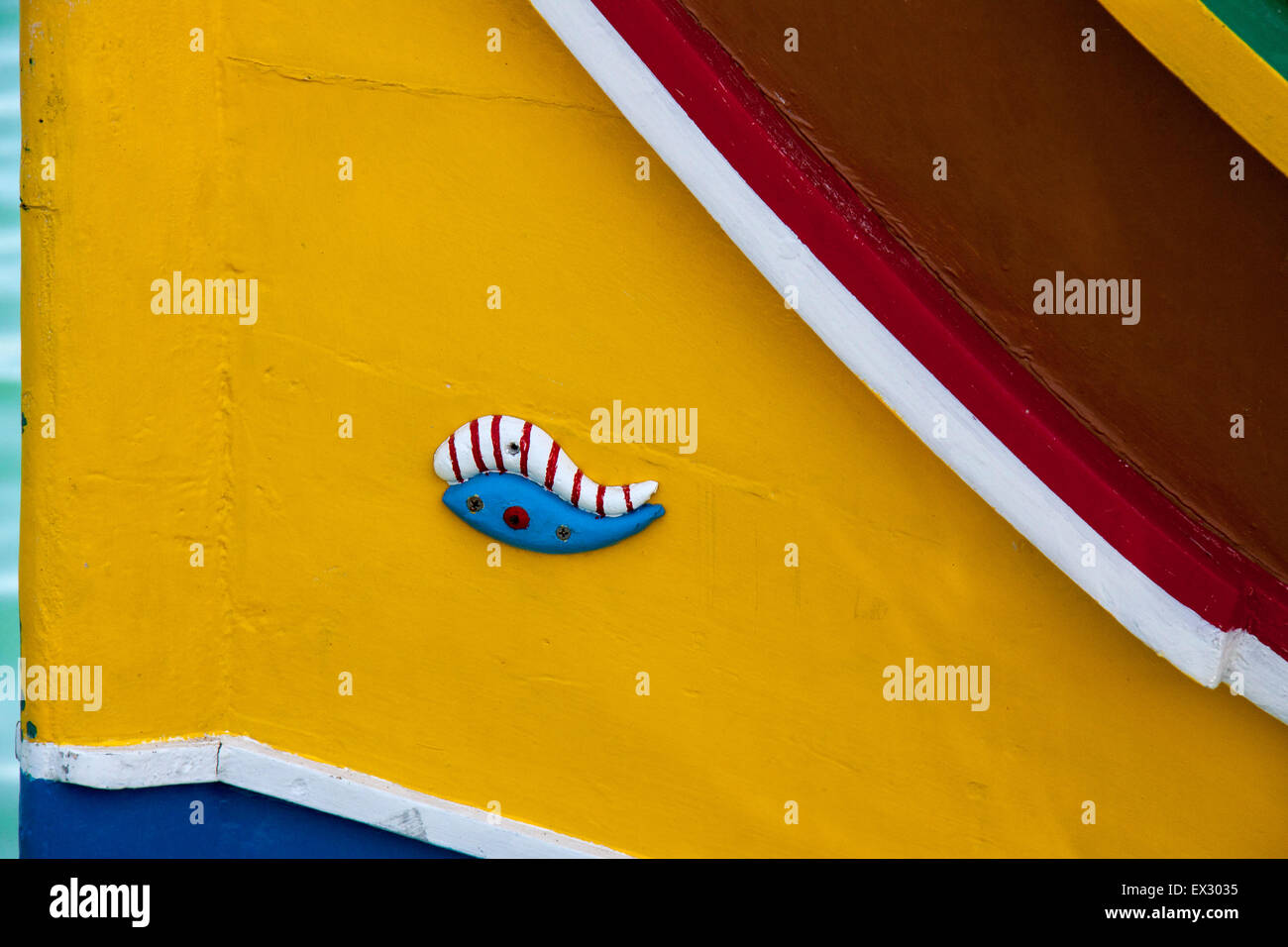 A traditional fishing boat in Malta. The fishing boats always display a form of eye design which is supposed to ward off evil sp Stock Photo