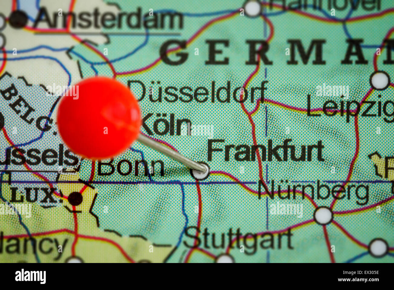 Close-up of a red pushpin on a map of Frankfurt, Germany Stock Photo