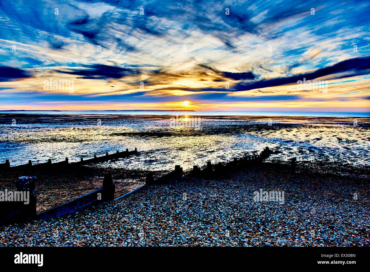 Summer's Sunset on Whitstable beach, England Stock Photo