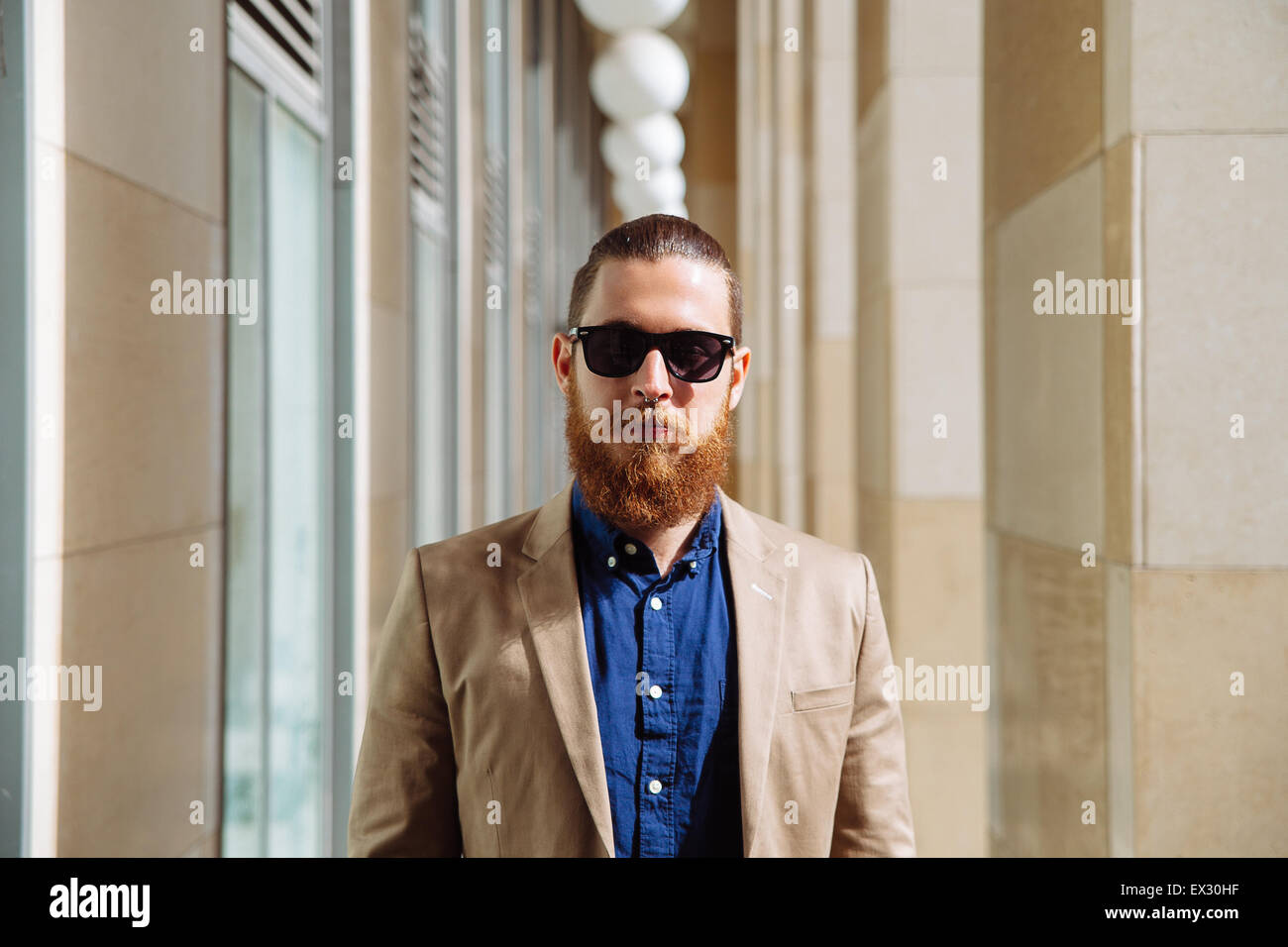 Bearded hipster sunglasses in the city Stock Photo